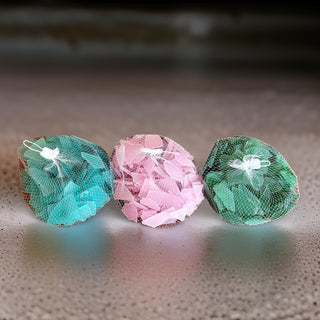 Decorative glass stones for styling plant pots, terrariums, and botanical displays.